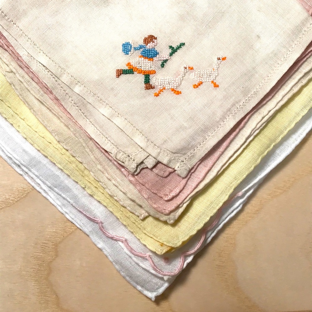 Bundle of vintage embroidered linen handkerchiefs
